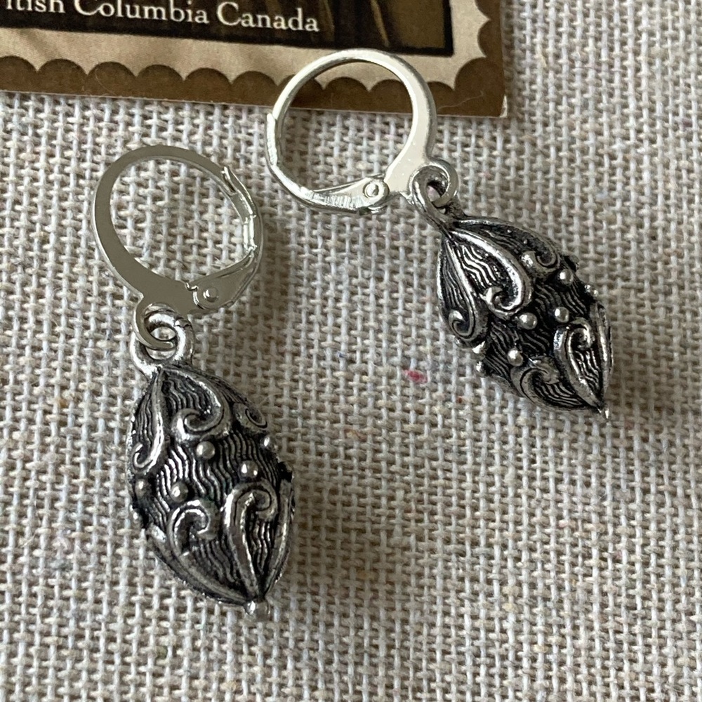 Silver Metal Oval Carved Bead Earrings